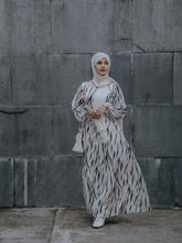 Yezwe V-neck modest dress in stylish print with flowing fabric, perfect for any occasion